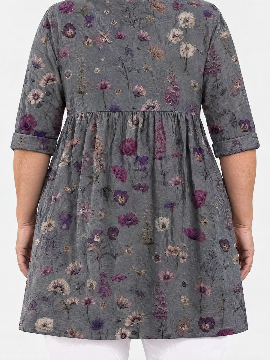 Addison long blouse back view on a plus-size model