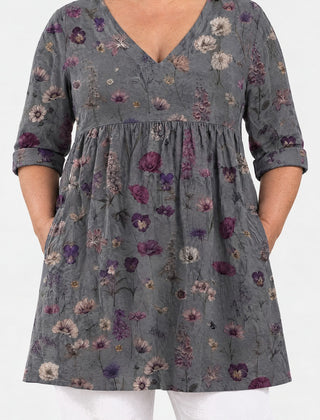 Addison long blouse front view on a plus-size model
