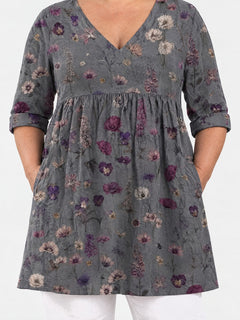 Addison long blouse front view on a plus-size model