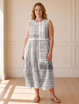 The Amara midi dress in black and white line print, front view