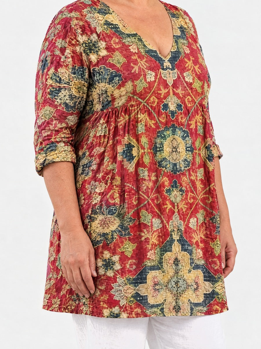 Amoura long blouse side view on a plus-size model