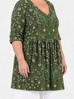 Cecelia long blouse side view on a plus-size model