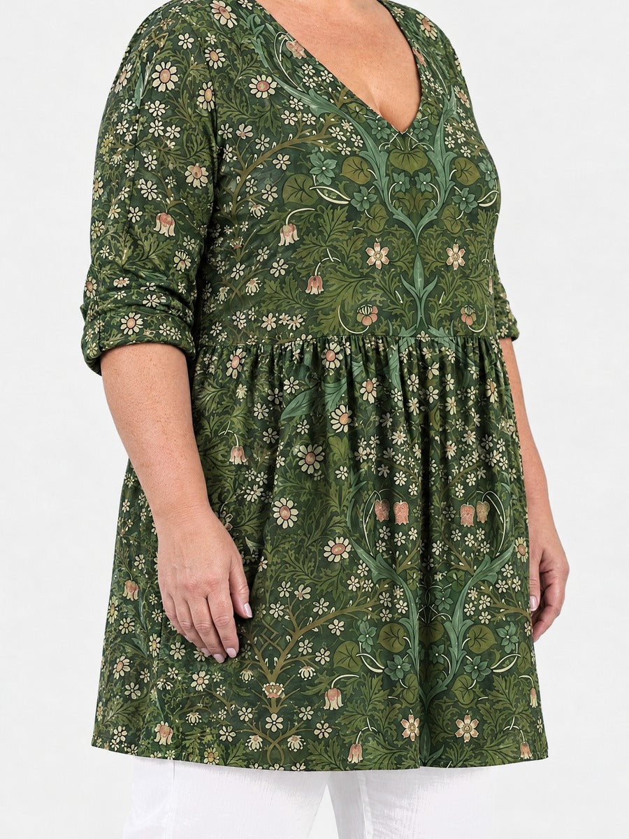 Cecelia long blouse side view on a plus-size model