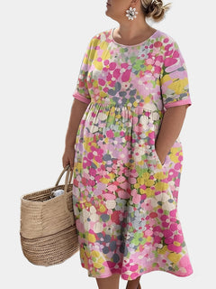 Elena painted floral midi dress on a plus-size model