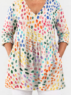 Everlee long blouse front view on a plus-size model