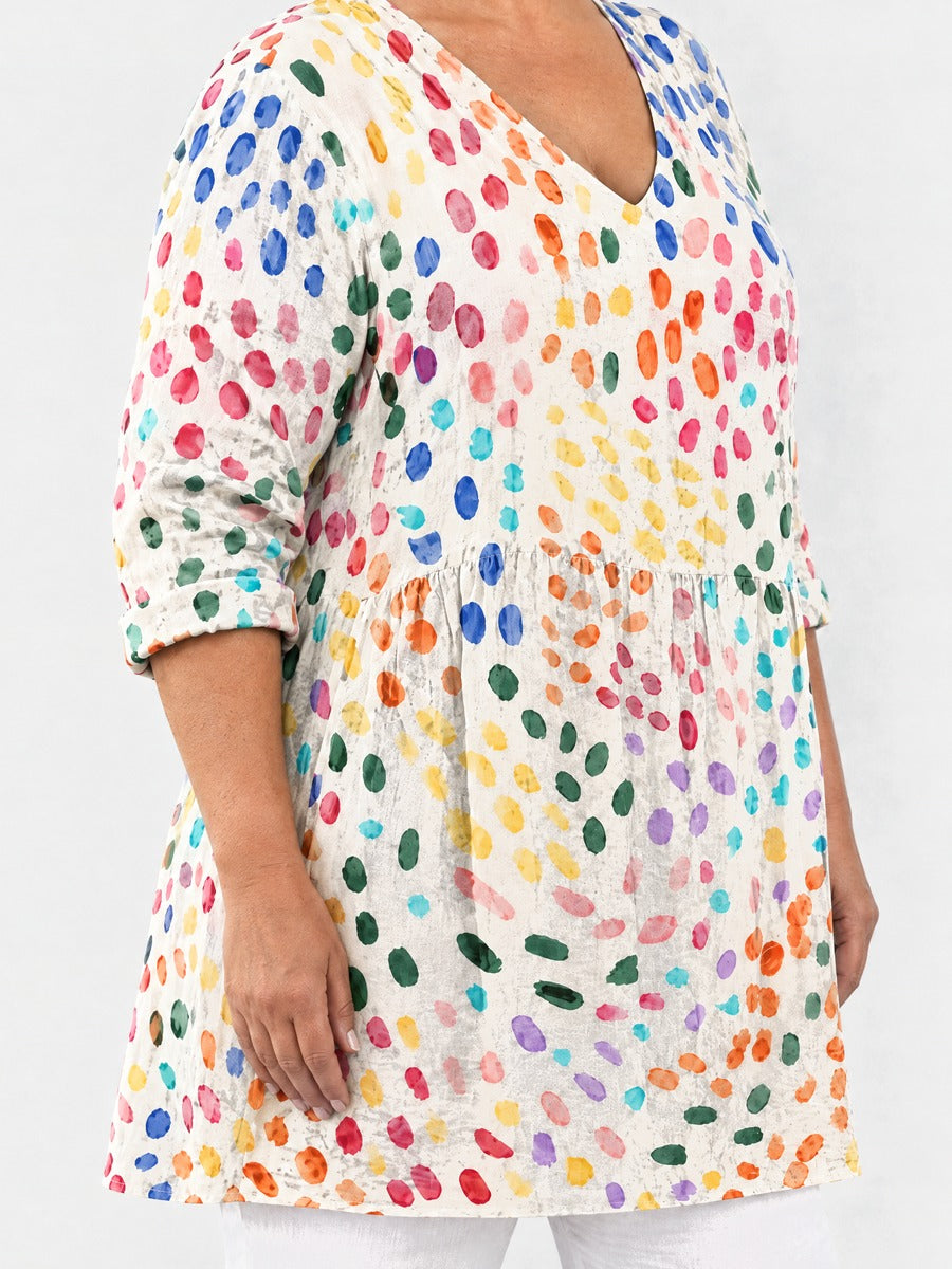 Everlee long blouse side view on a plus-size model