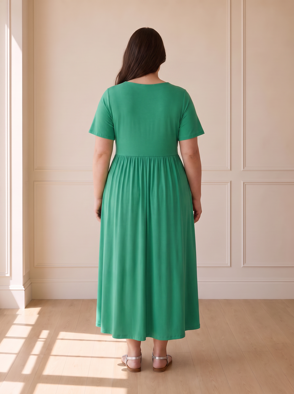 Isadora A-line midi dress in green, back view