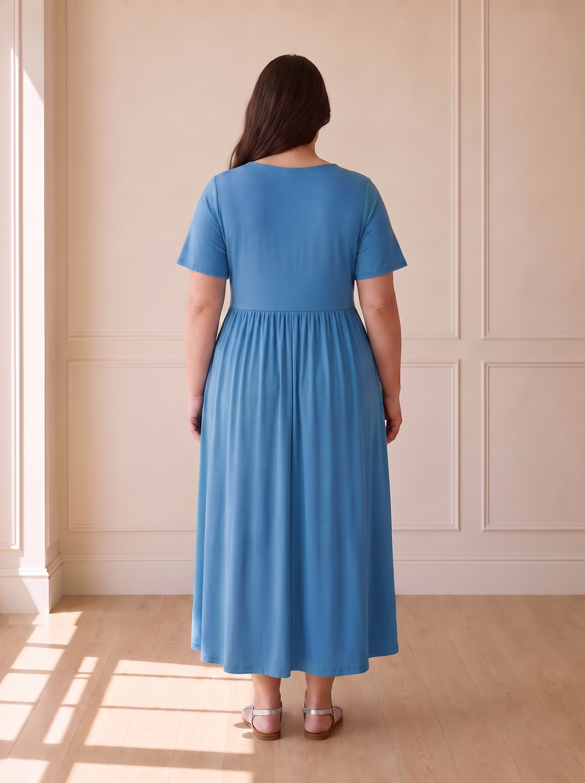 Isadora A-line midi dress in blue, back view
