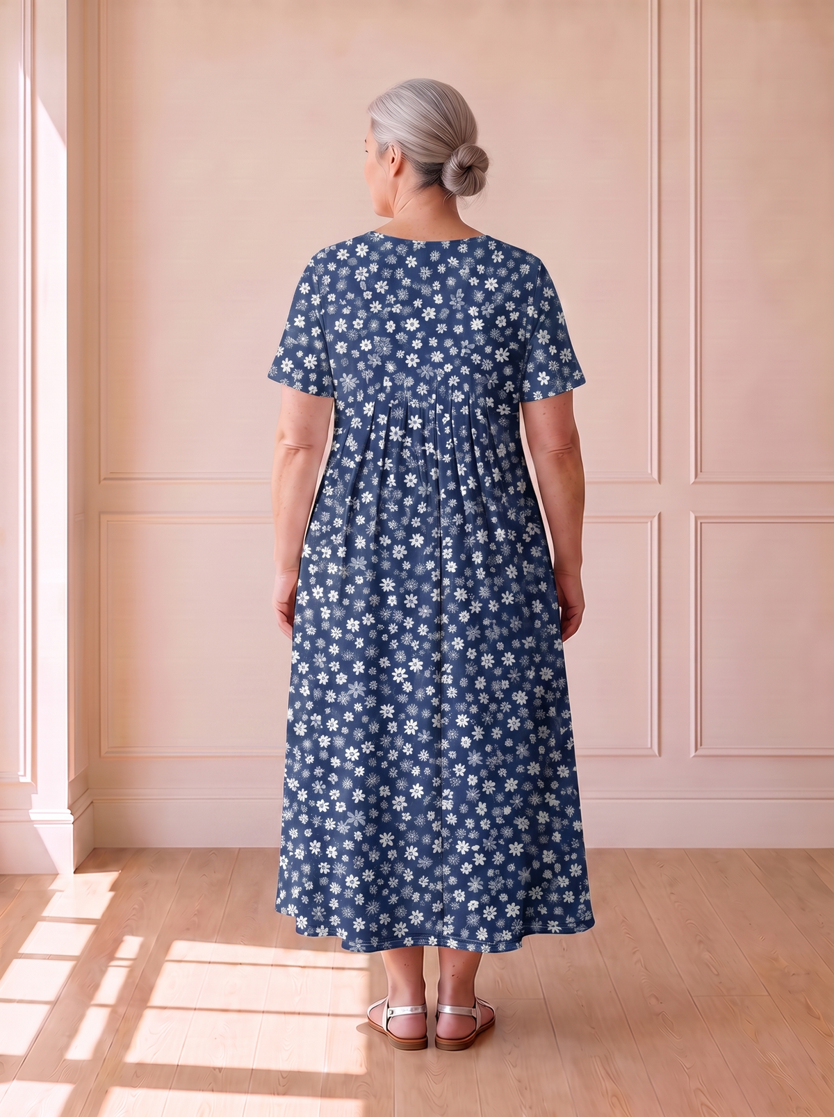 Georgina pleated A-line dress in blue floral, back view