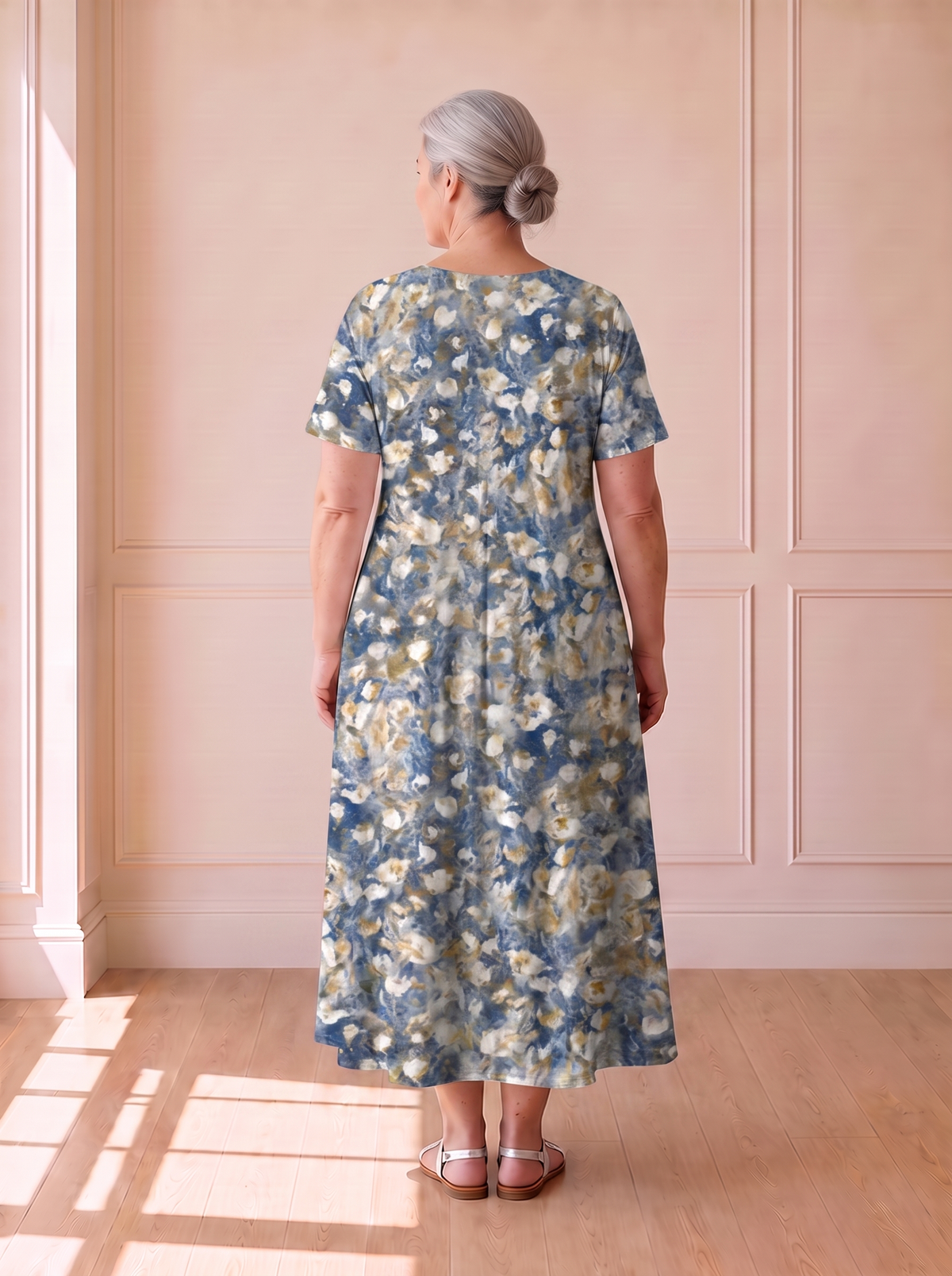 Georgina pleated A-line dress in light blue floral, back view