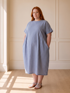 Susana striped cocoon midi dress in blue, front view, worn by a plus-size model