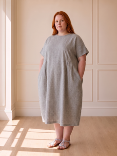 Susana striped cocoon midi dress in grey, front view, worn by a plus-size model