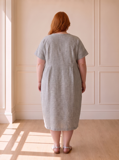 Susana striped cocoon midi dress in grey, back view, worn by a plus-size model