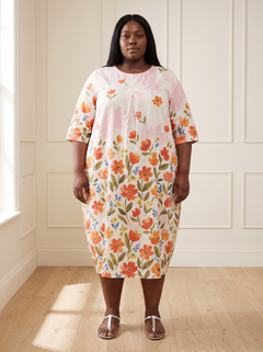 Leila floral cocoon midi dress in red, front view, worn by a plus-size model