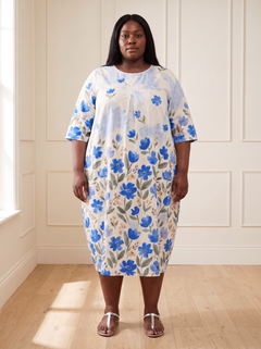 Leila floral cocoon midi dress in blue, front view, worn by a plus-size model