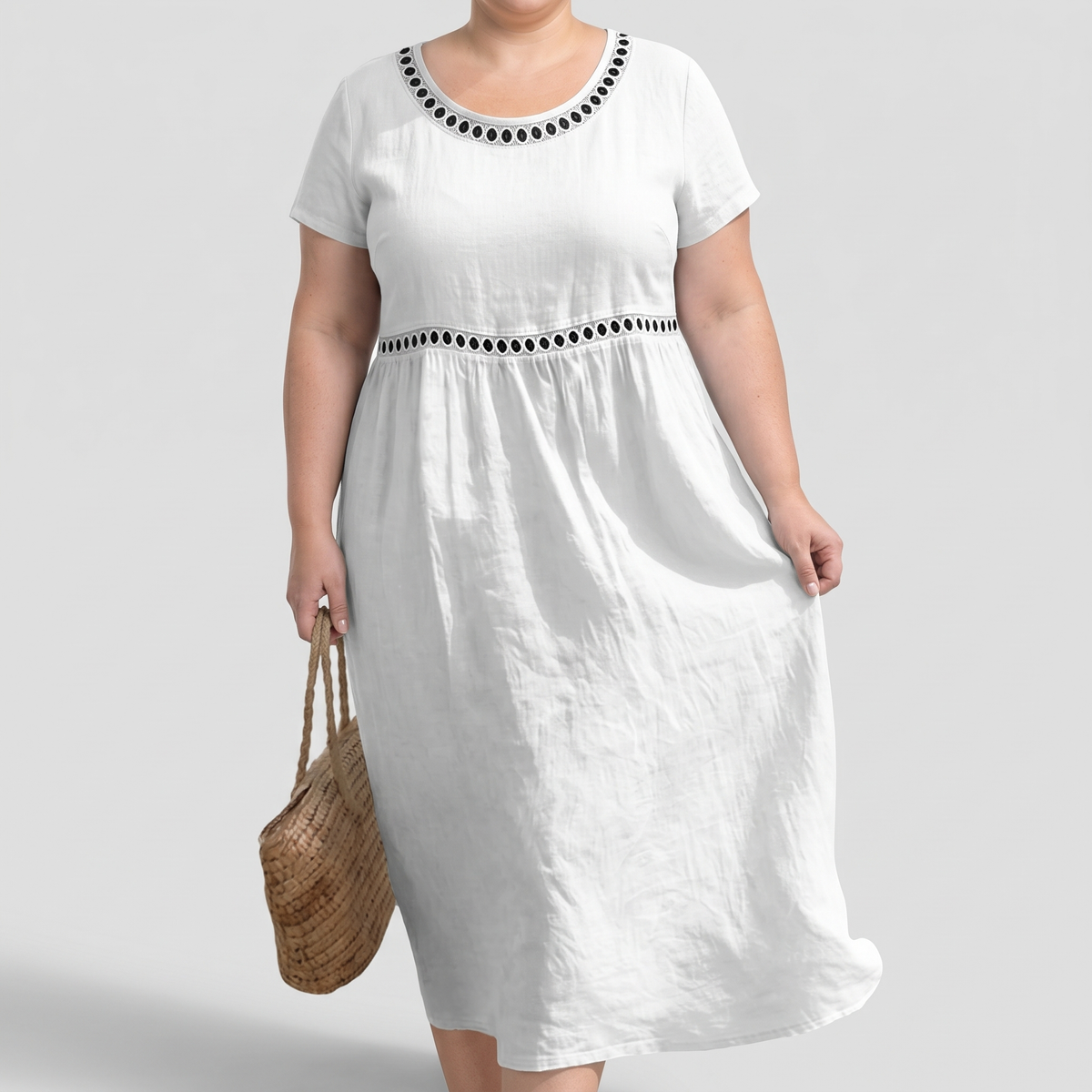 Tera openwork linen midi dress in white on a plus-size model