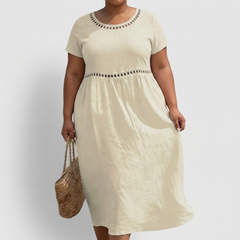 Tera openwork linen midi dress in beige on a plus-size model
