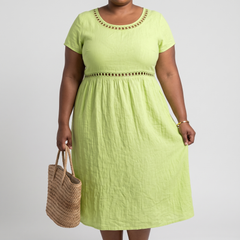 Tera openwork linen midi dress in green on a plus-size model