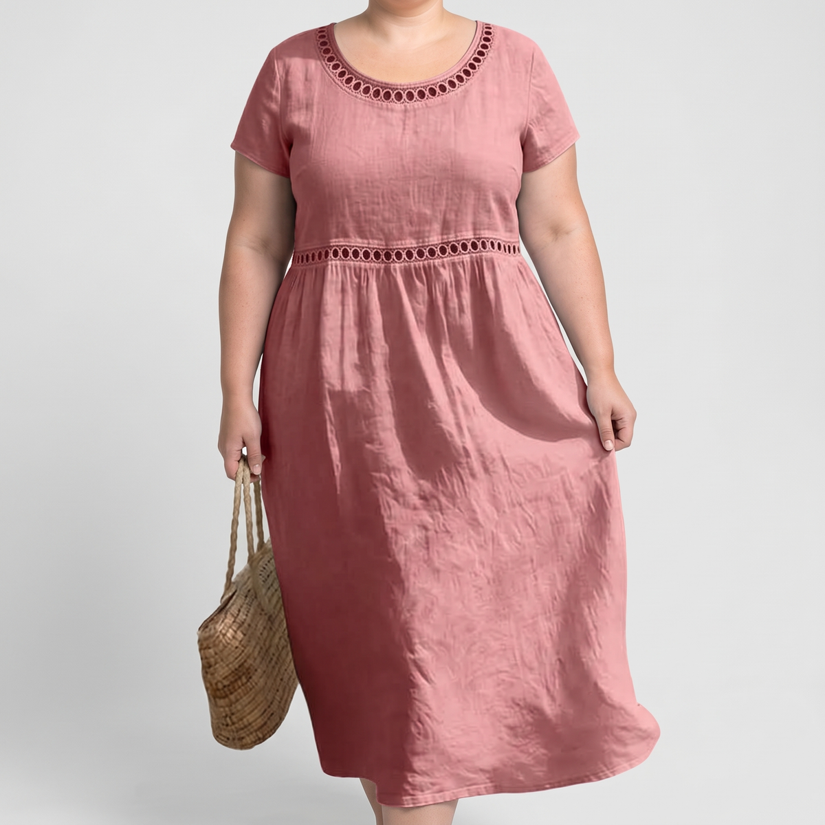 Tera openwork linen midi dress in pink on a plus-size model