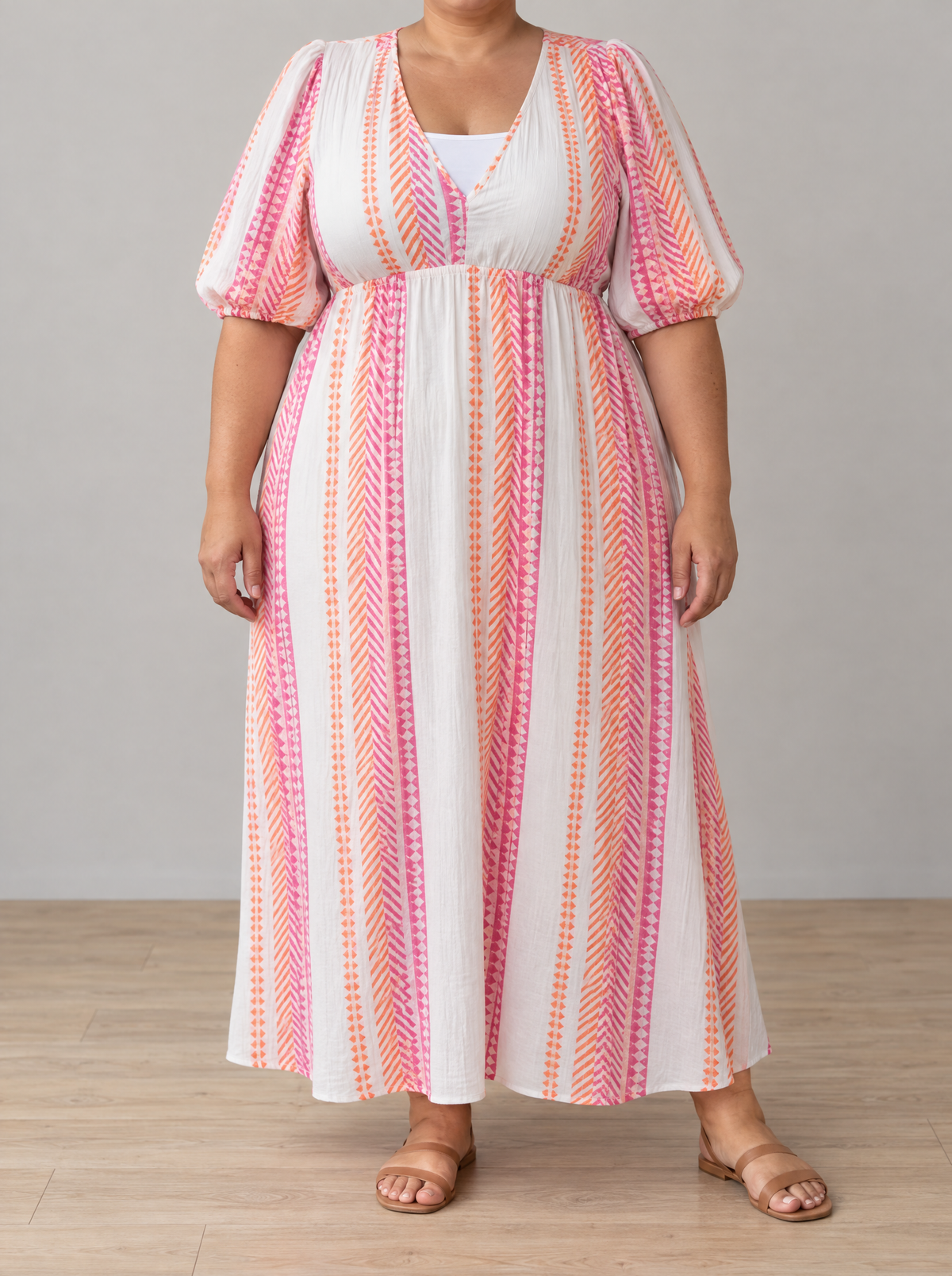 Sophia V-neck print maxi dress in white on a plus-size model