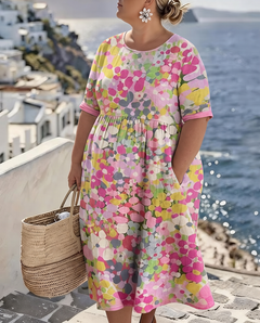 Elena painted floral midi dress in pink on a plus-size model