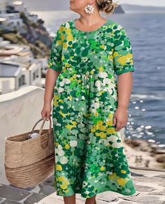 Elena painted floral midi dress in green on a plus-size model