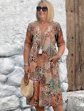 Susan dappled print midi dress in beige on a plus-size model