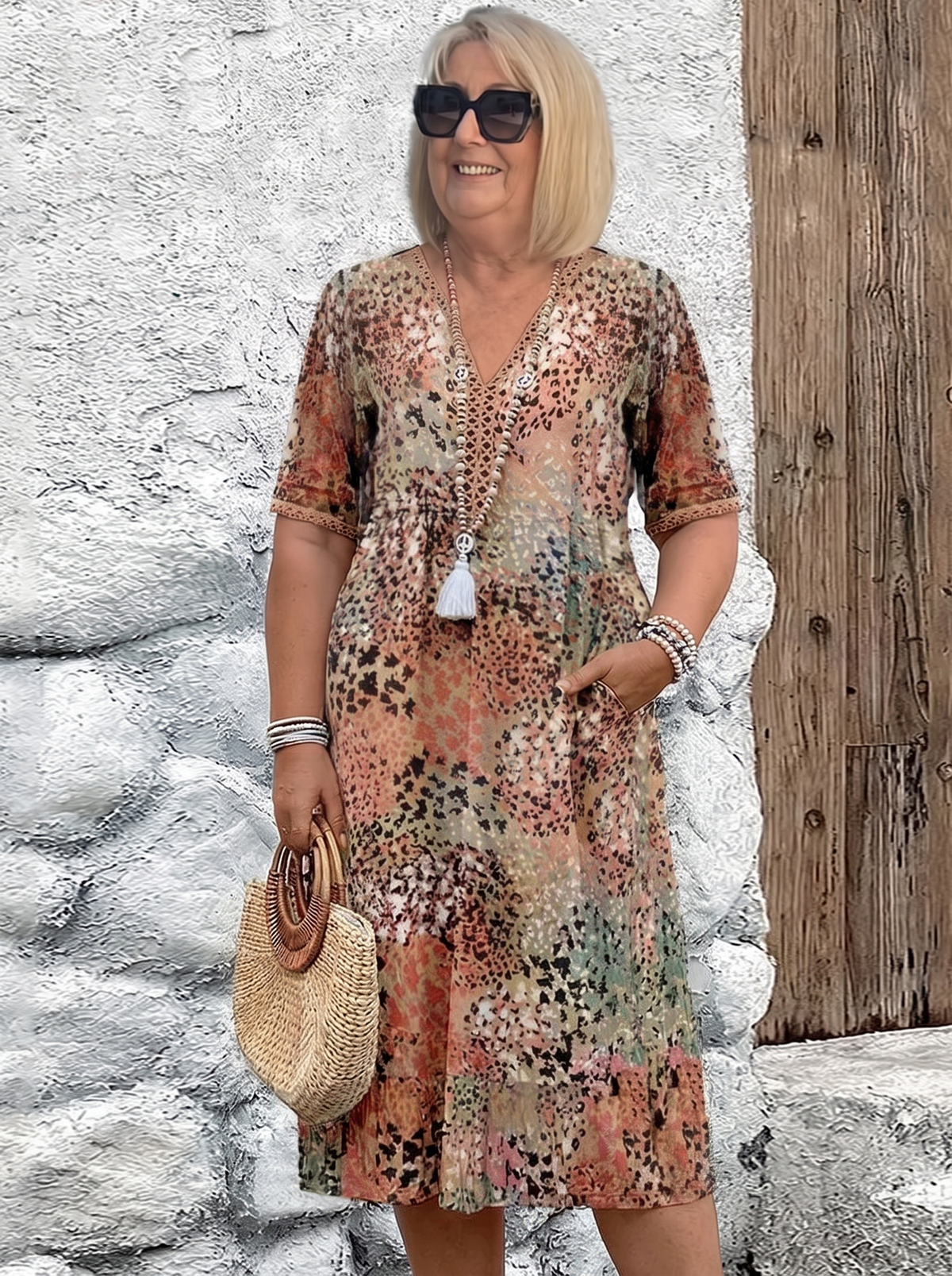 Susan dappled print midi dress in beige on a plus-size model