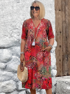 Susan dappled print midi dress in red on a plus-size model