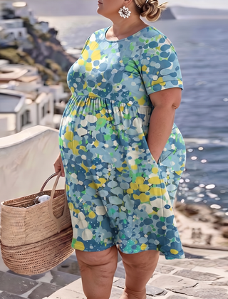 Elena painted floral midi dress in blue on a plus-size model