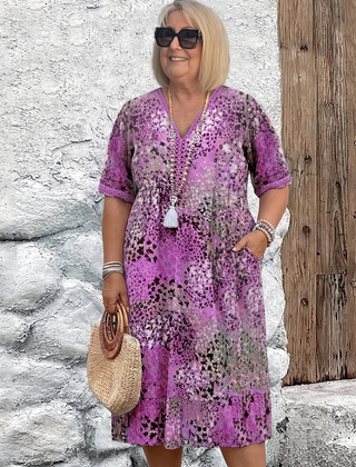 Susan dappled print midi dress in purple on a plus-size model