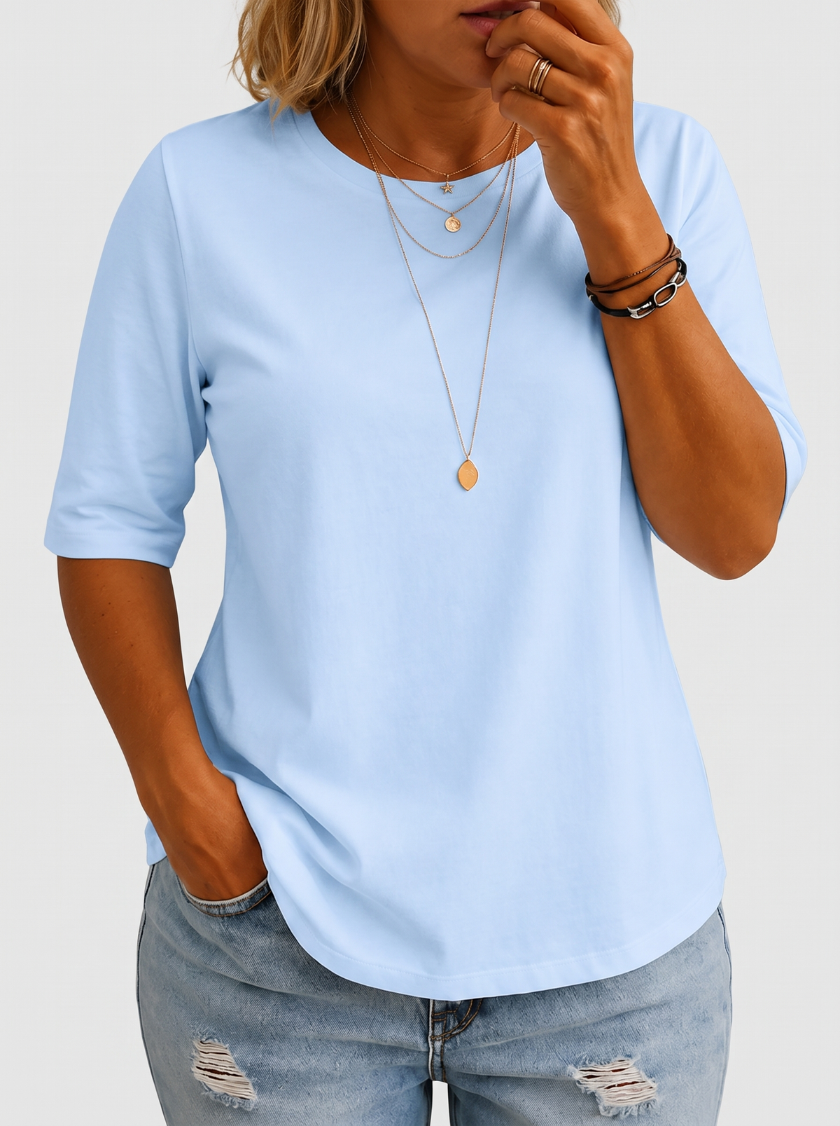 Harper half-sleeve crew neck tee in blue on a plus-size model