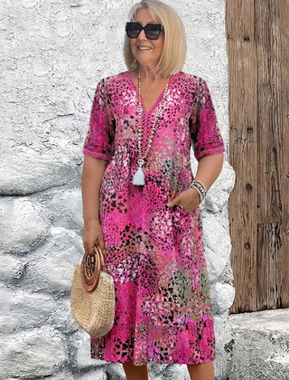 Susan dappled print midi dress in pink on a plus-size model