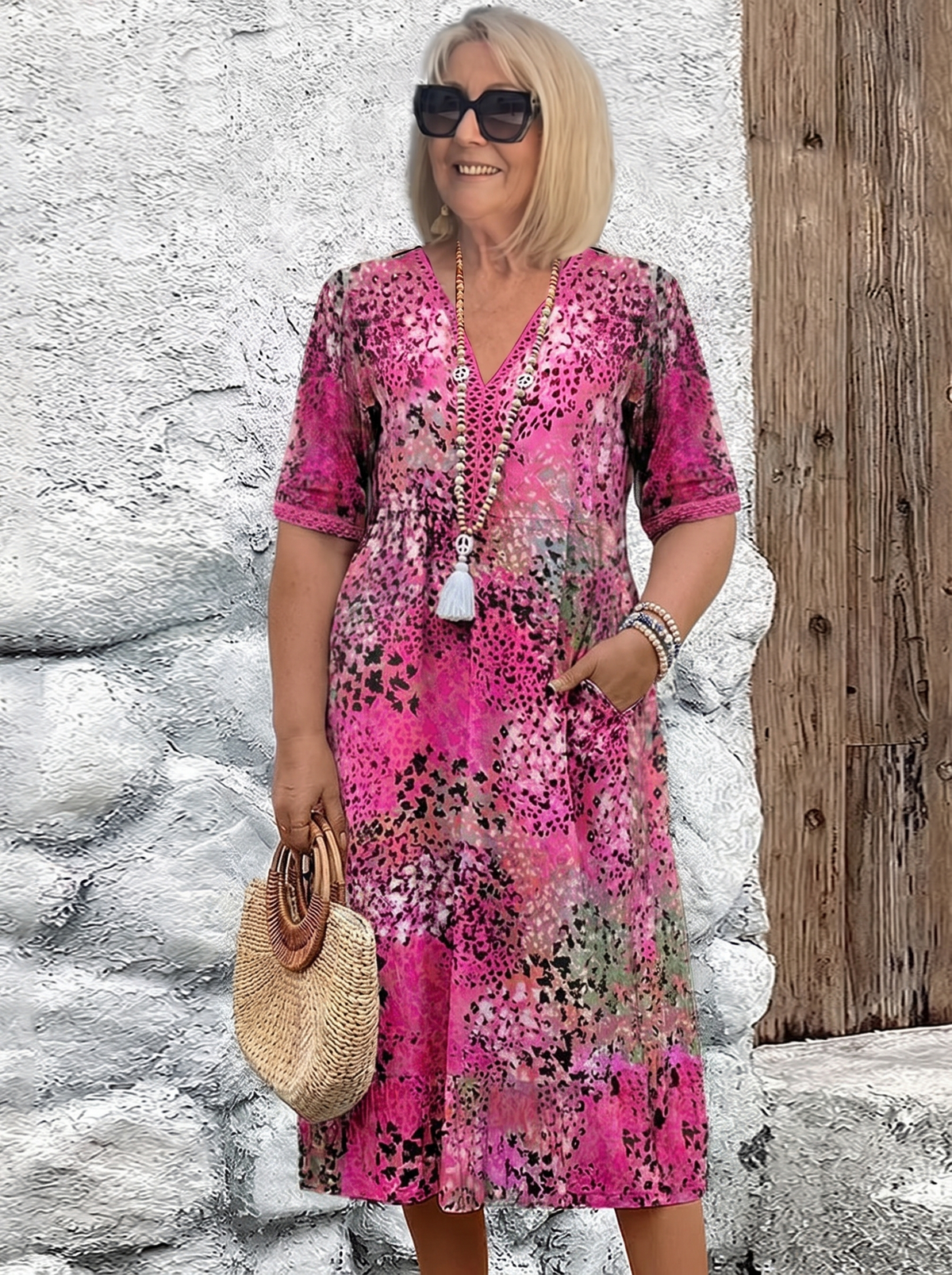 Susan dappled print midi dress in pink on a plus-size model