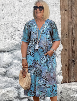 Susan dappled print midi dress in blue on a plus-size model