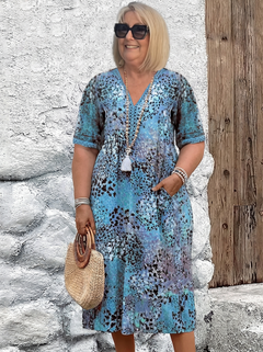 Susan dappled print midi dress in blue on a plus-size model