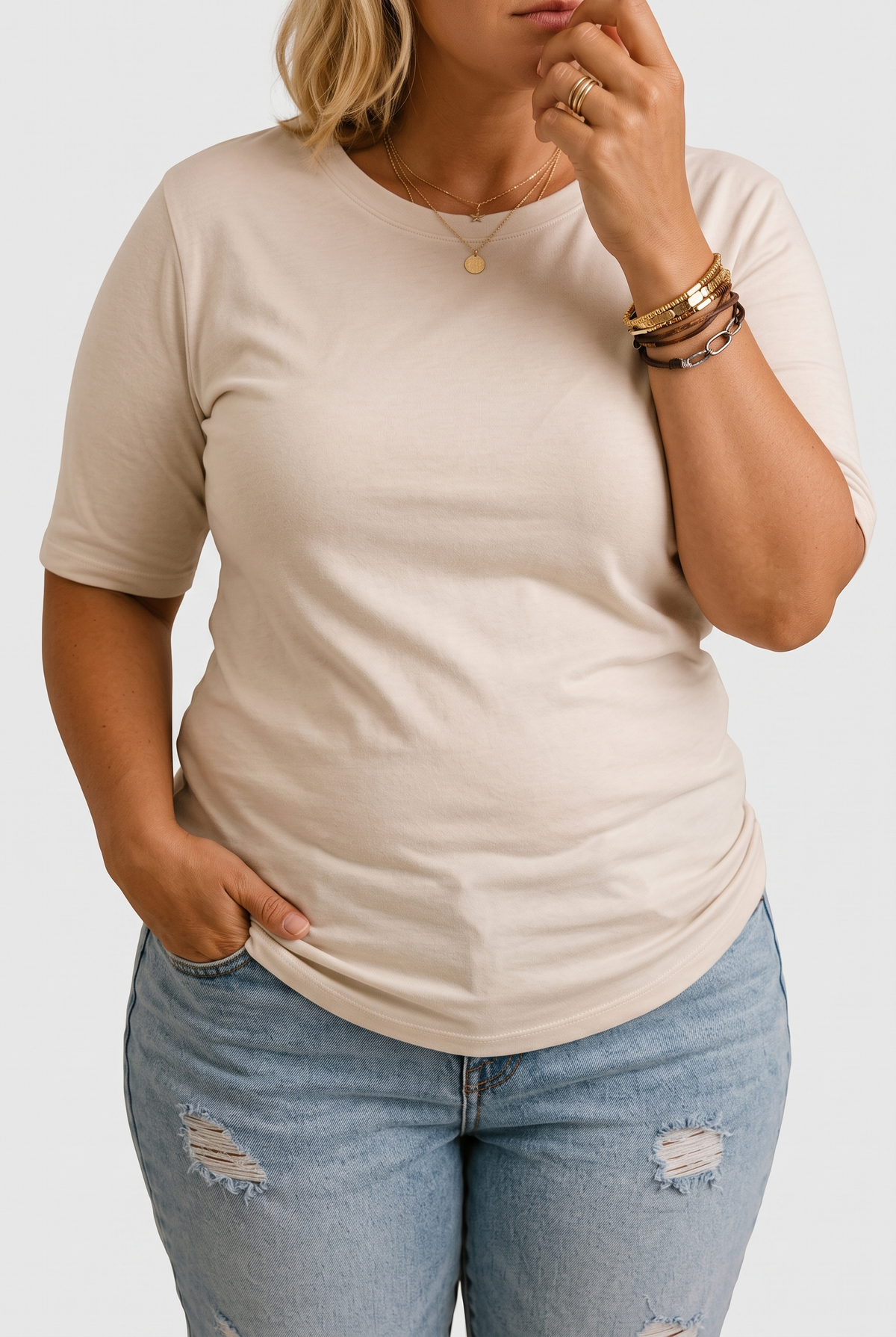 Harper half-sleeve crew neck tee in beige on a plus-size model