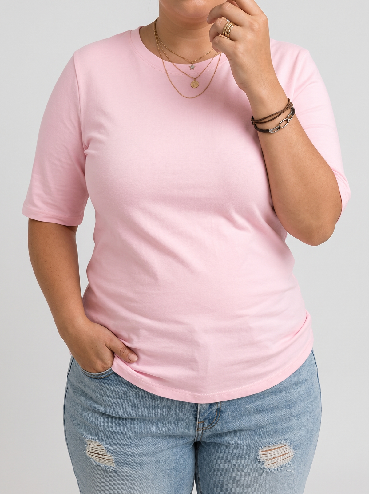 Harper half-sleeve crew neck tee in pink on a plus-size model