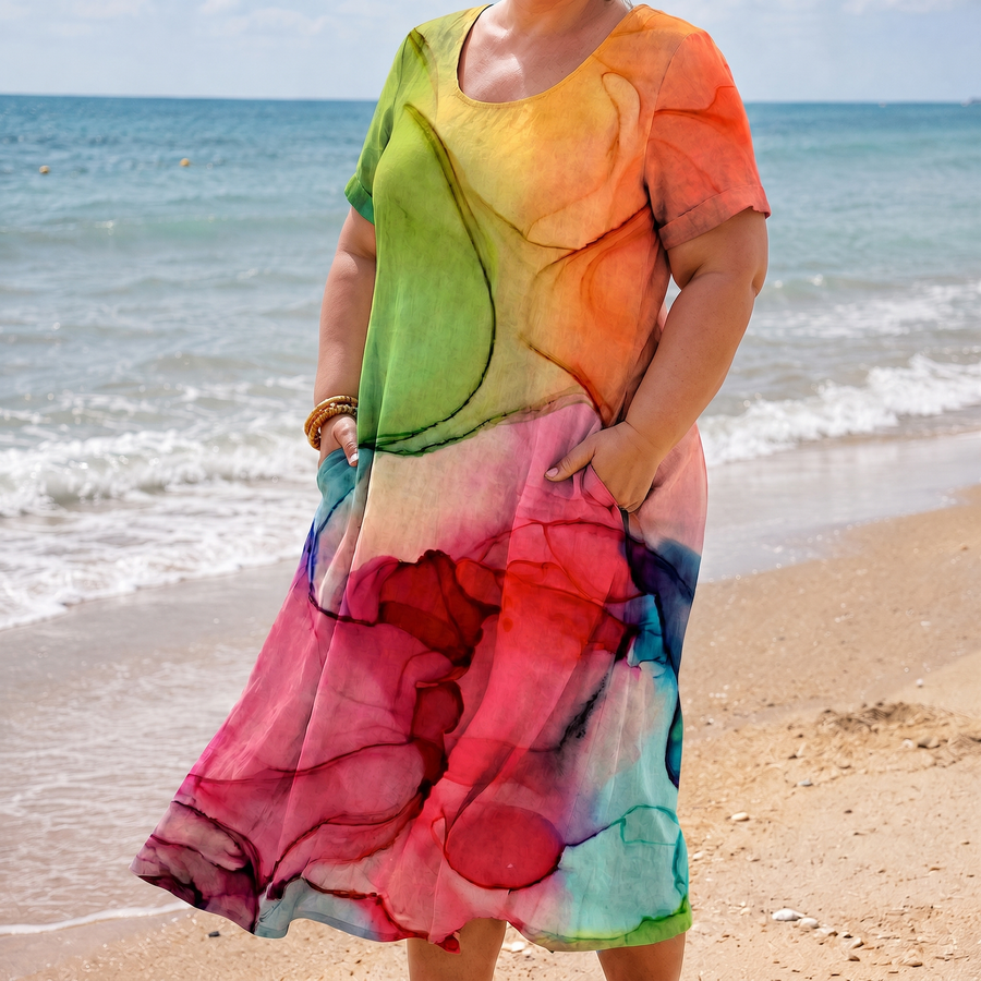 Madison pocket dress in tie dye on the beach
