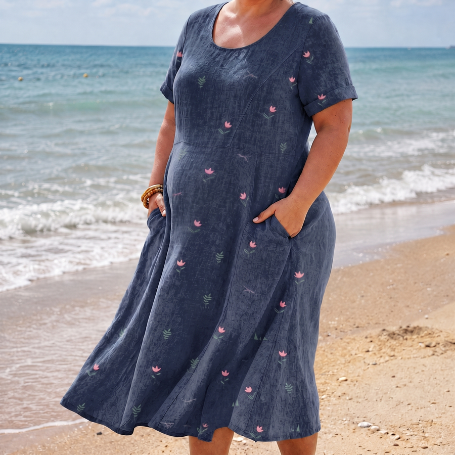 Maggie navy pocket dress on the beach