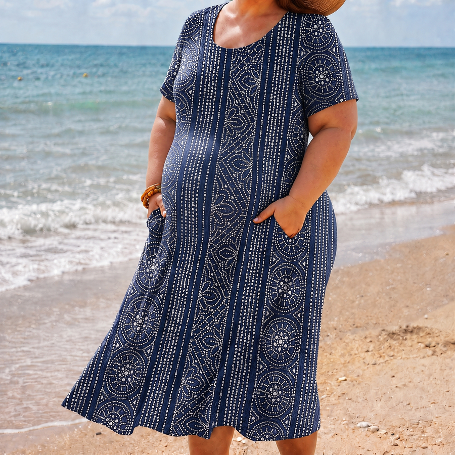 Riley navy pocket dress on the beach
