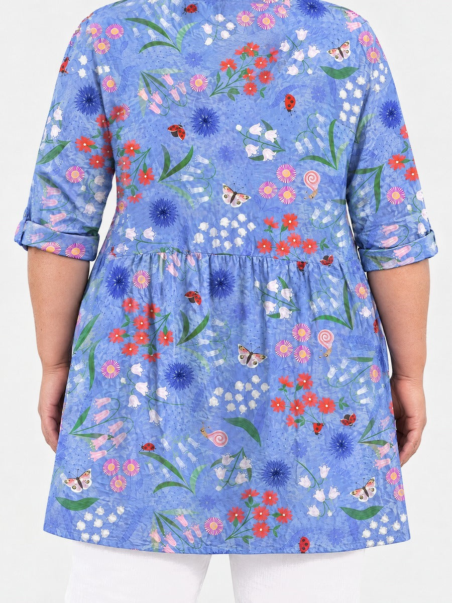 Josie long blouse back view on a plus-size model