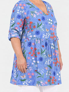 Josie long blouse side view on a plus-size model