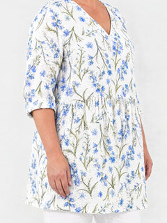 Lenora long blouse side view on a plus-size model