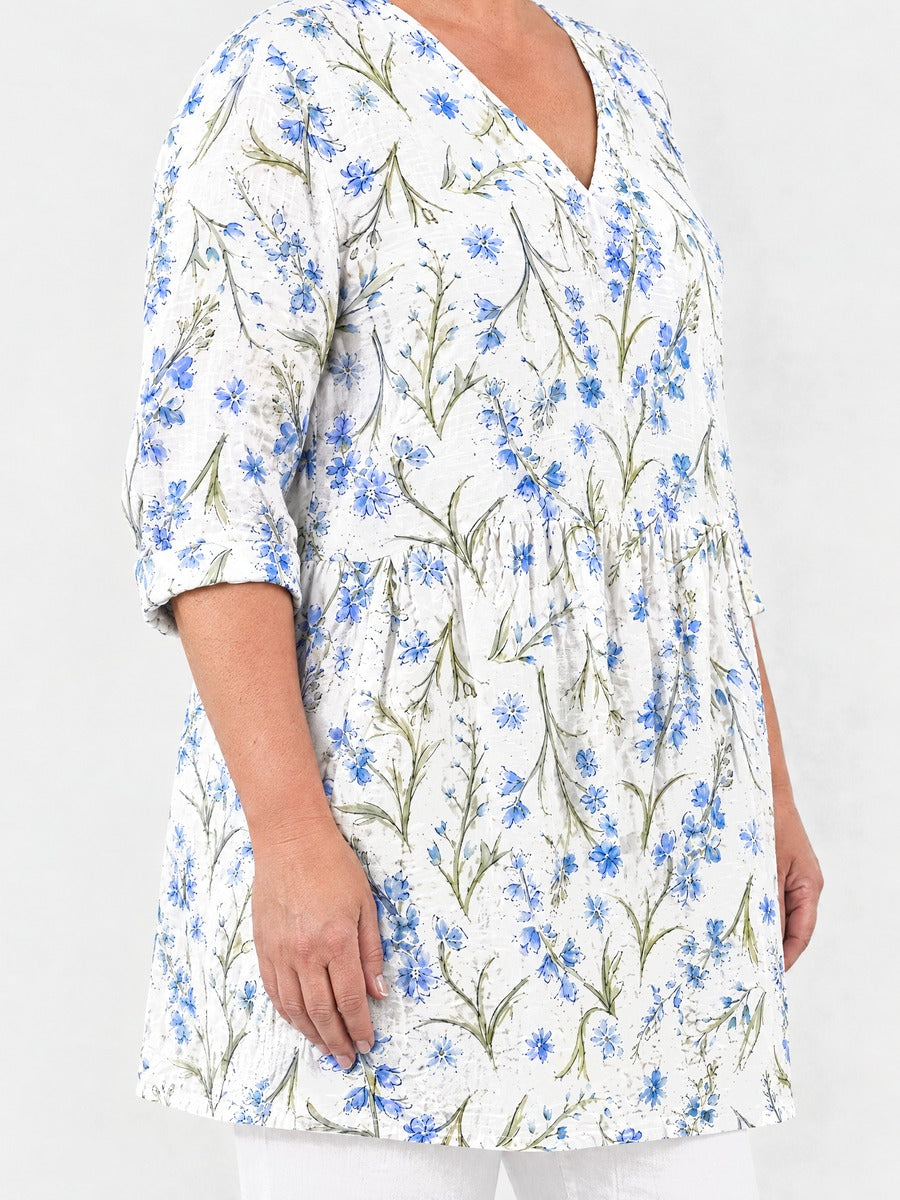 Lenora long blouse side view on a plus-size model