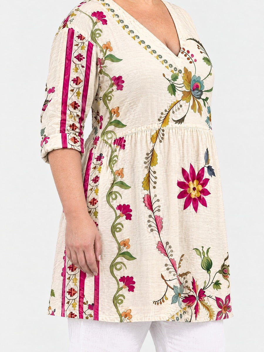 Lottie long blouse side view on a plus-size model