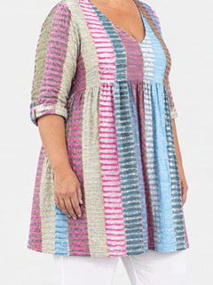 Margo long blouse side view on a plus-size model