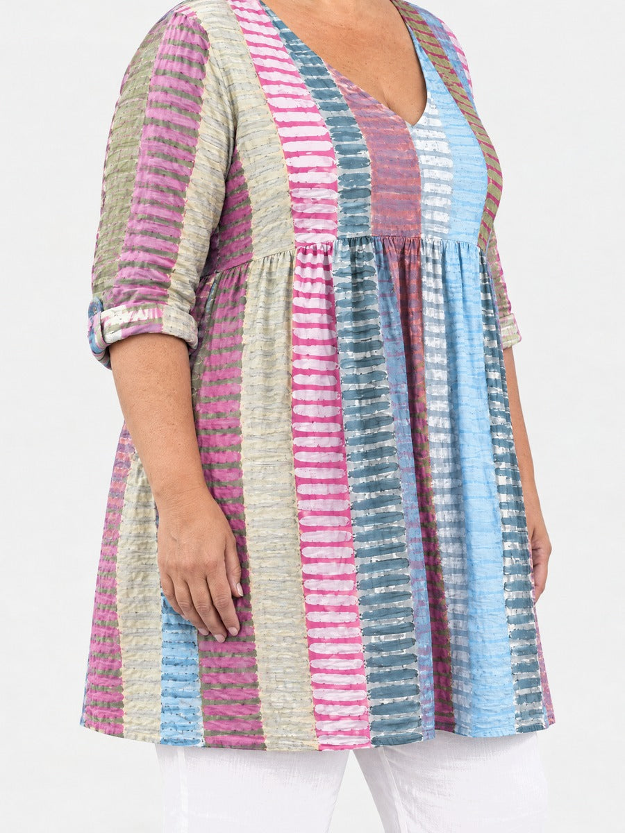 Margo long blouse side view on a plus-size model