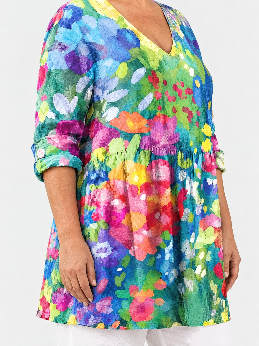 Millie long blouse side view on a plus-size model