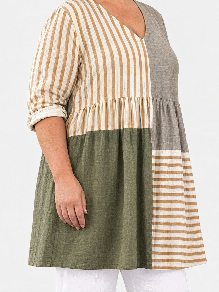 Natalie long blouse side view on a plus-size model